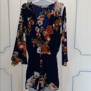 Navy blue floral long sleeve romper